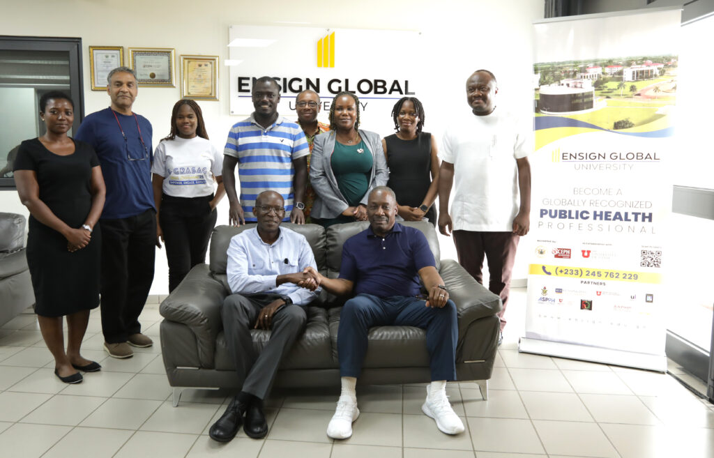 Large grouof people including WSPH dean Thomas LaVeist, and faculty from the school and from Ensign Global university in Ghana